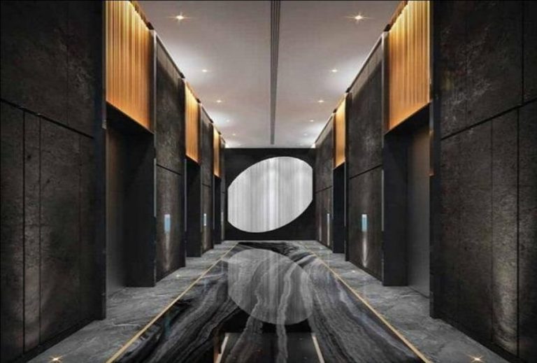 Building lobby with lift at V Tower in Dubailand Residence Complex