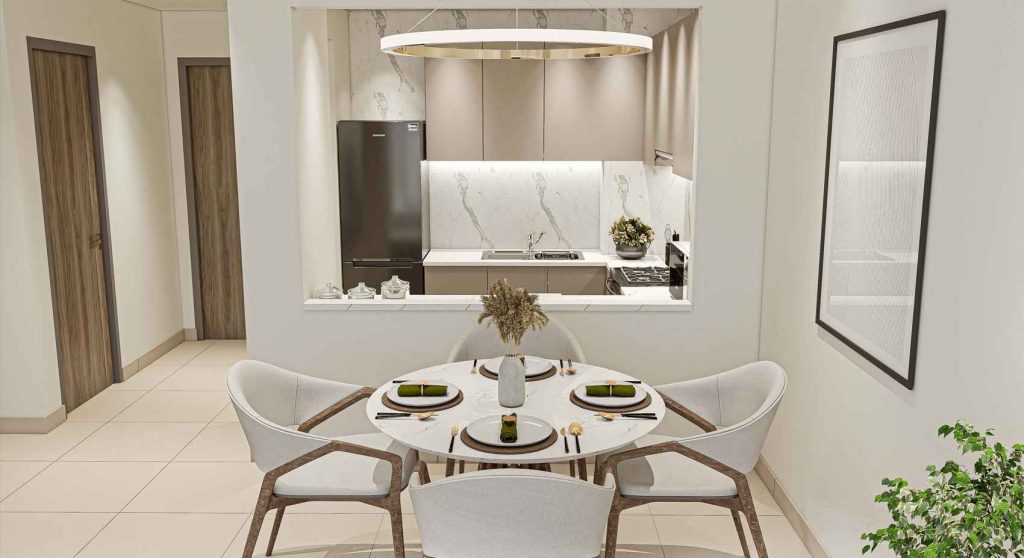 dining area and kitchen in a 1 bedroom apartment at Glorious Central Residences Warsan 4