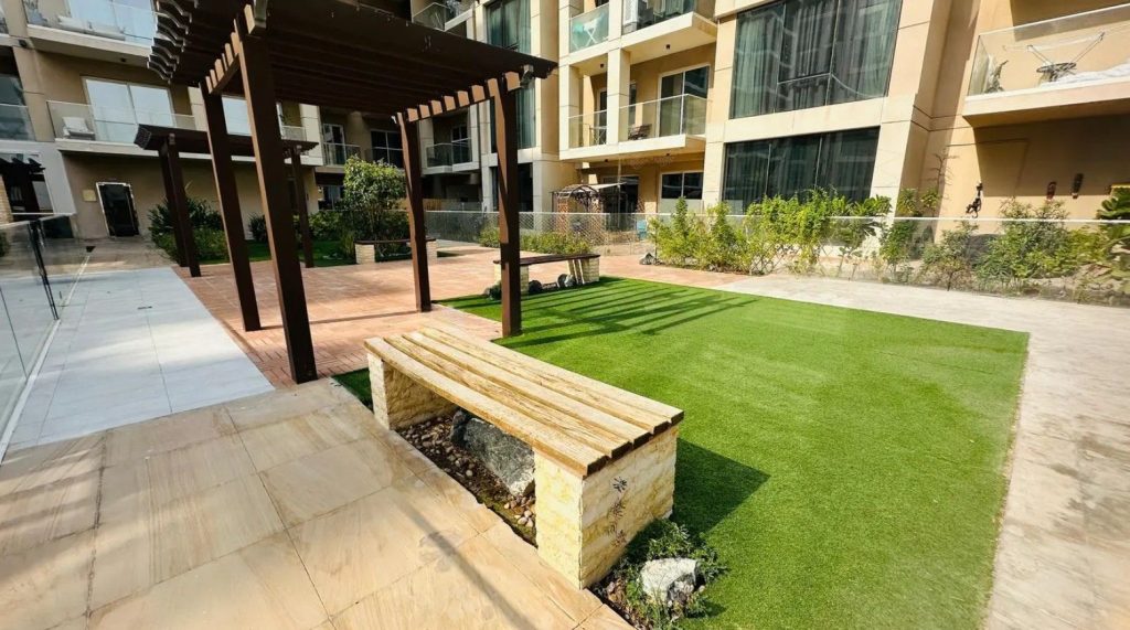2 Bedroom Apartment for Sale in Sherena Residence Majan Dubai 589 Landscaped garden and sitting area at Sherena Residence Majan Dubailand