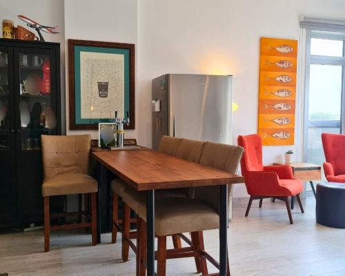 Furnished 2 Bedroom Apartment for Sale in Grenland Residence 604 spacious dining area in a 2 bedroom apartment for sale in Grenland Residence Dubai with closed kitchen and maid's room