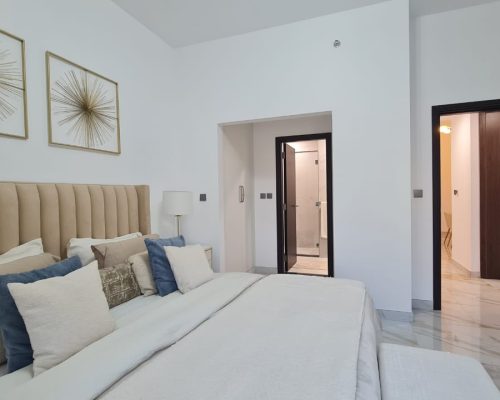 New 2 Bed Apartment for Sale with a Balcony & Close Kitchen in Dubai 575 Master bedroom in a 2 Bedroom Apartment For Sale with a Balcony & Close kitchen in Barari Hills Residence Majan Dubai