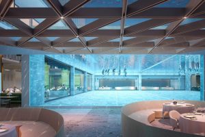 Portofino Hotel restaurant with views over the swimming pool at the Heart of Europe Dubai