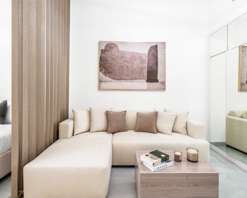 spacious living area in a ready to move studio apartment for sale in OST Tower 11 Majan Dubailand