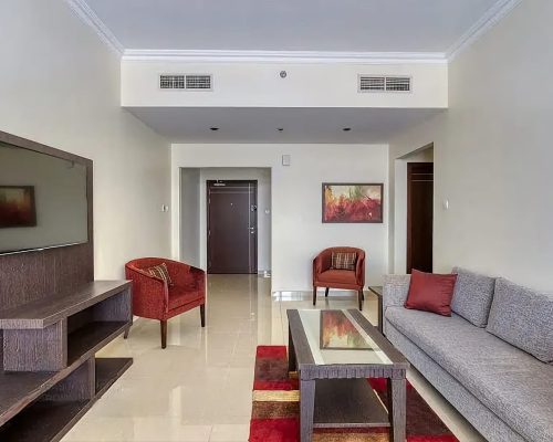 living araea in a 2-bedroom apartment for sale in Siraj Tower Arjan Dubai
