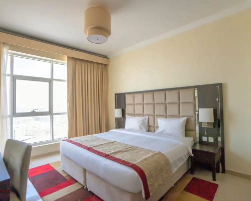 master bedroom in a 2-bedroom apartment for sale in Siraj Tower Arjan Dubai