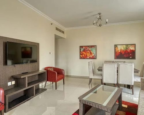 spacious living room in a 3 bedroom apartment for sale in Siraj Tower Arjan Dubai
